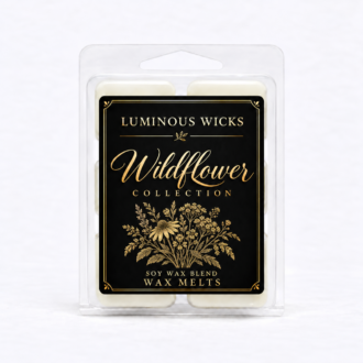 Wildflower soy wax blend melts in a clear clamshell with a professional black and gold collection label